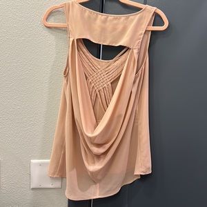 Super cute back. Pink/nude nice tank top. Blouse like material.